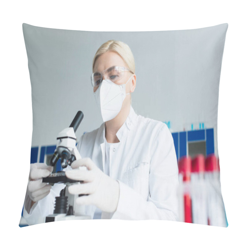 Personality  Scientist In Goggles And Latex Gloves Using Microscope Near Blurred Test Tubes In Lab  Pillow Covers