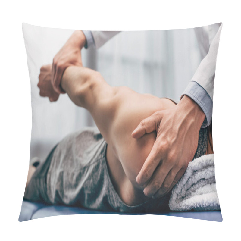 Personality  Selective Focus Of Chiropractor Stretching Arm Of Patient In Hospital Pillow Covers