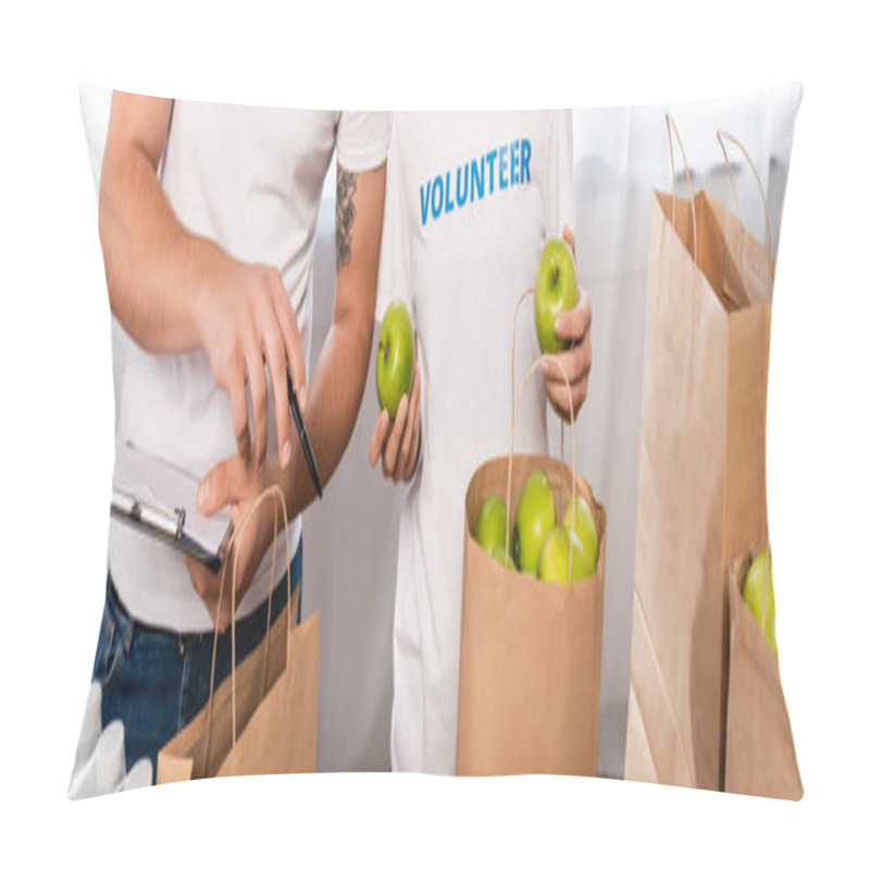 Personality  Panoramic Crop Of Volunteer With Clipboard Pointing With Hand Near Woman Holding Apples And Packages In Charity Center  Pillow Covers