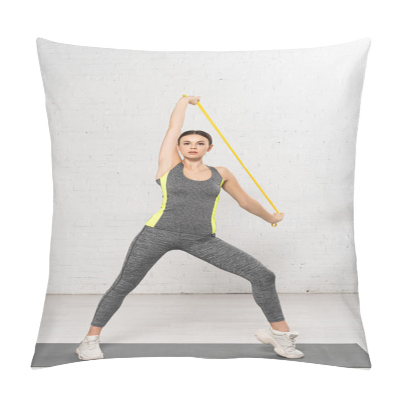 Personality  Sportive Woman Working Out With Resistance Band On Fitness Mat Near White Brick Wall  Pillow Covers