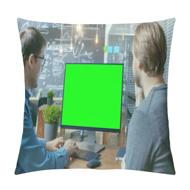 Personality  Two Office Employees Have Project Related Discussion, On The Desk Stands Personal Computer With Mock-up Green Screen. They Work In The Creative Office Environment. Pillow Covers