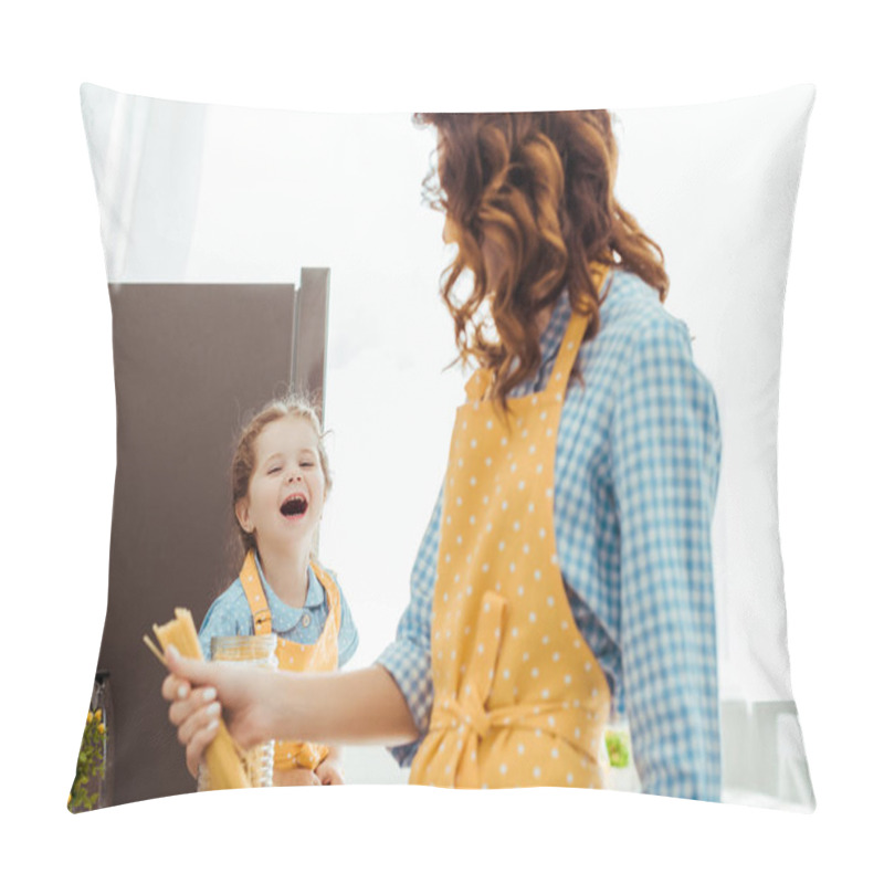 Personality  Selective Focus Of Mother Holding Raw Spaghetti And Looking At Excited Daughter Pillow Covers