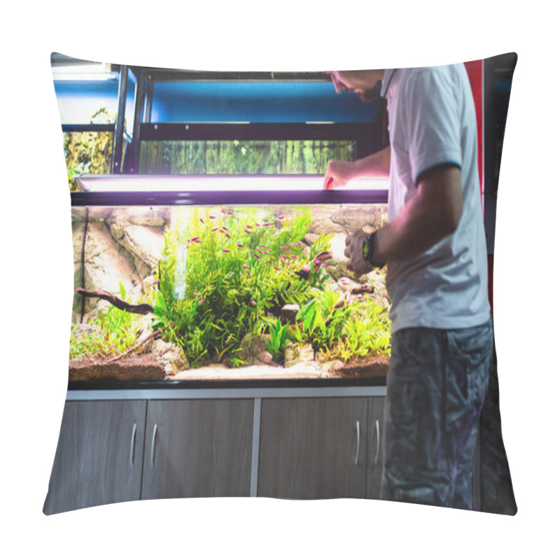 Personality  Male Worker In Aquarium Shop Feeding Fishes. Pillow Covers