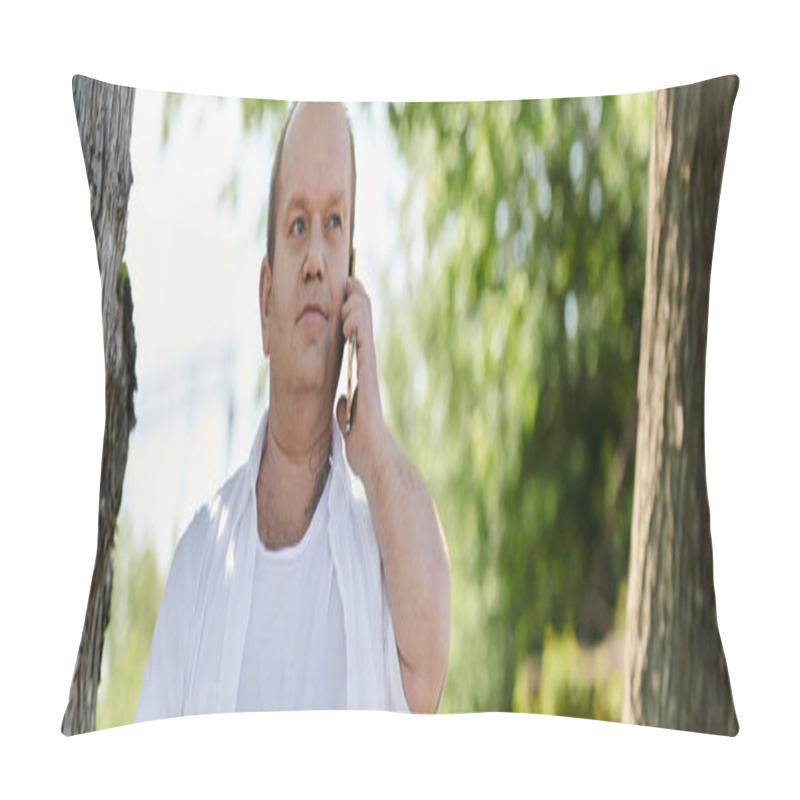 Personality  A Man With Inclusivity In A White Shirt Stands Near A Tree, Looking Contemplative As He Speaks On His Phone. Pillow Covers