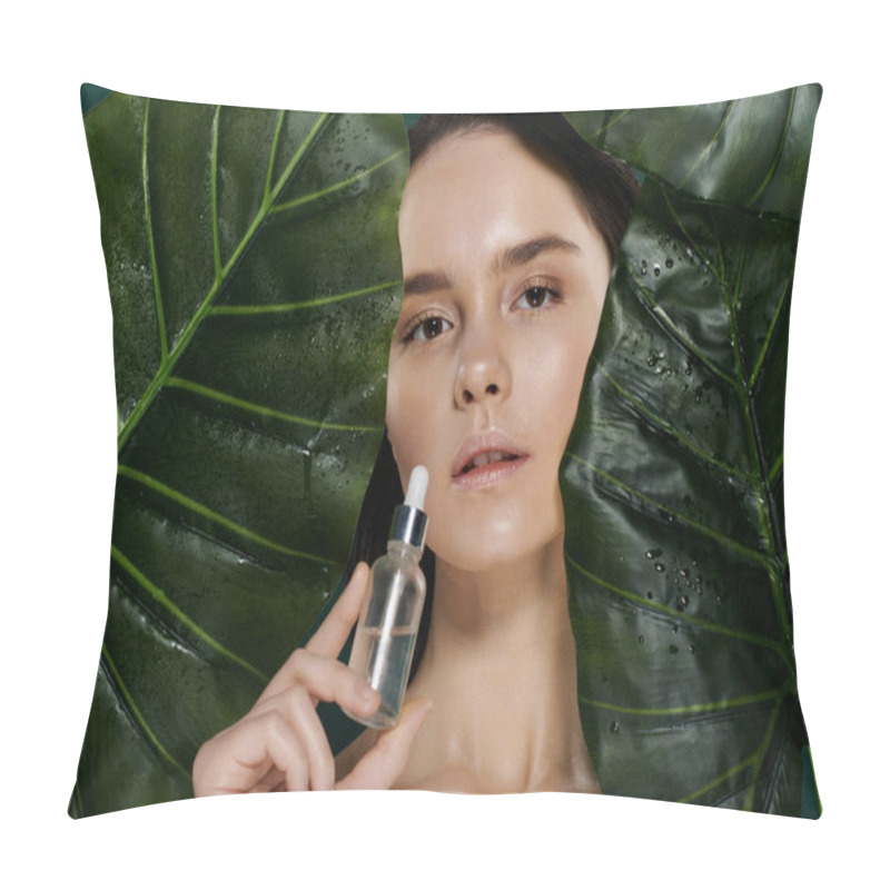 Personality  A Young Woman Poses With A Serum Bottle, Her Face Framed By Vibrant, Dewy Leaves. Pillow Covers