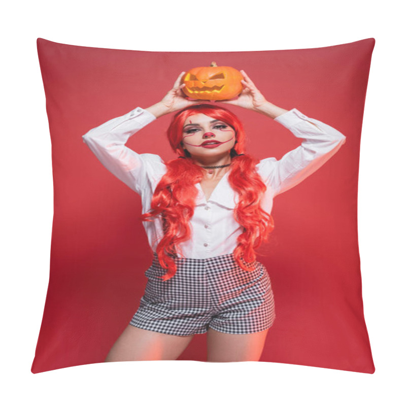 Personality  Young Redhead Woman In Halloween Makeup Holding Carved Pumpkin Over Head Isolated On Red Pillow Covers