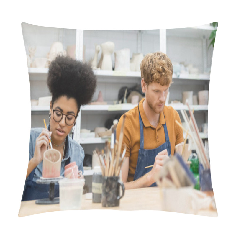 Personality  Interracial Couple In Aprons Painting On Clay Sculptures During Date In Pottery Studio  Pillow Covers