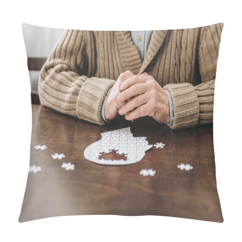 Personality  Cropped View Of Retired Man Playing With Puzzles On Table Pillow Covers