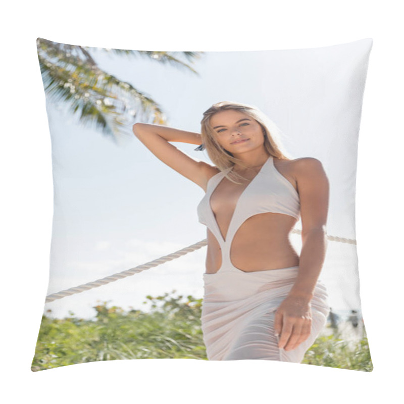 Personality  A Stunning Blonde Woman In A Flowing White Dress Striking A Pose By The Ocean On Miami Beach. Pillow Covers