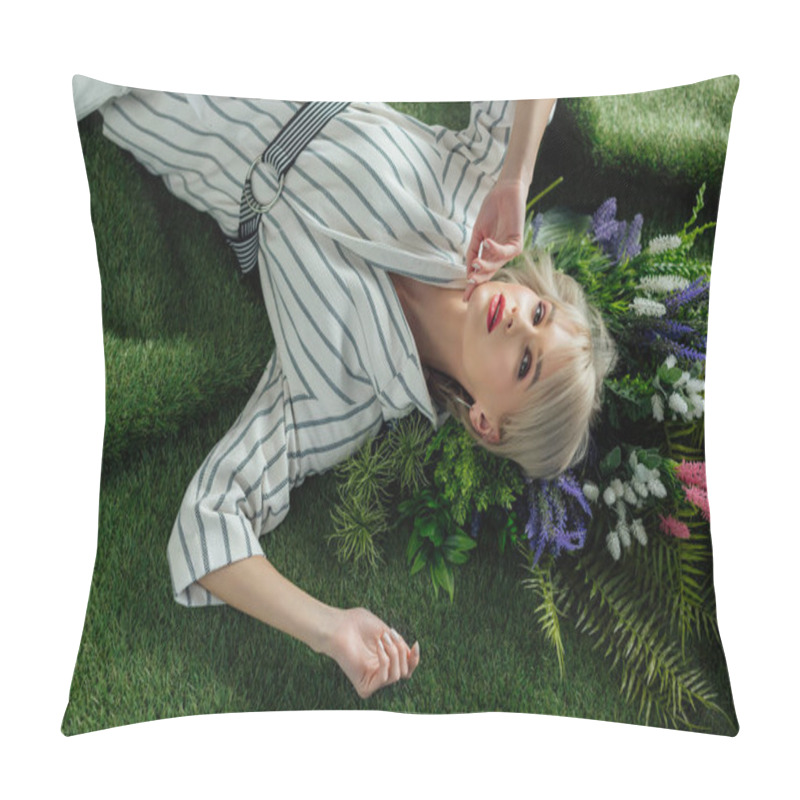 Personality  High Angle View Of Beautiful Stylish Young Woman Looking At Camera While Lying On Artificial Grass With Fern And Flowers Pillow Covers