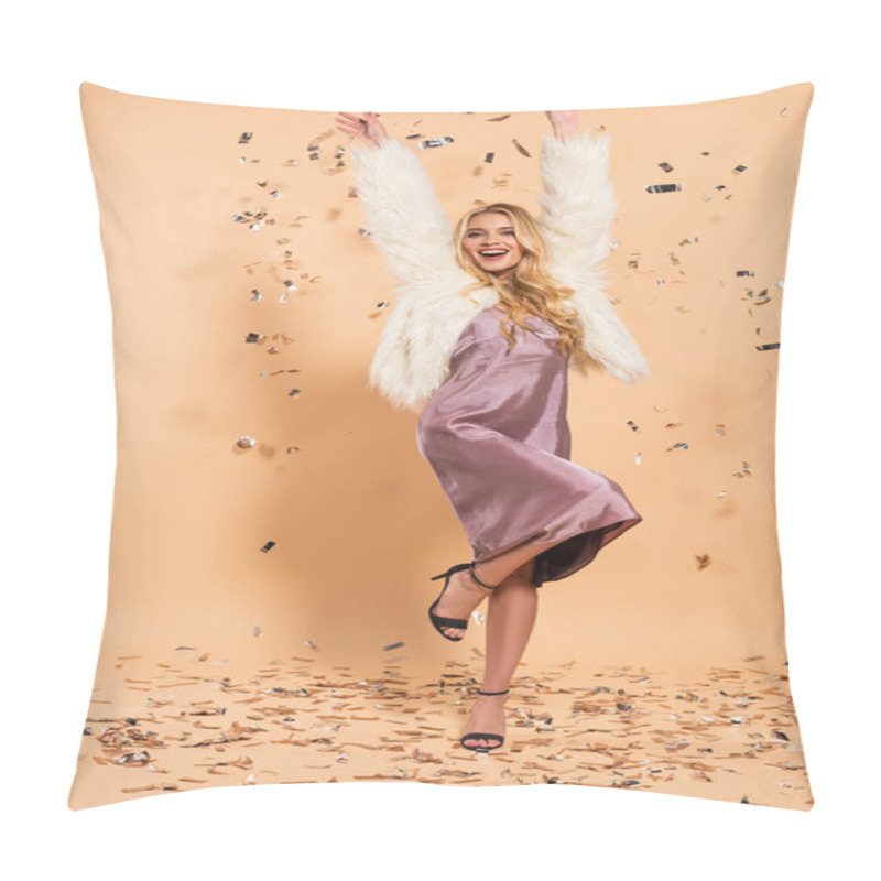 Personality  Happy Blonde Woman In Violet Satin Dress And Faux Fur Coat Dancing Under Silver Falling Confetti On Beige Background Pillow Covers