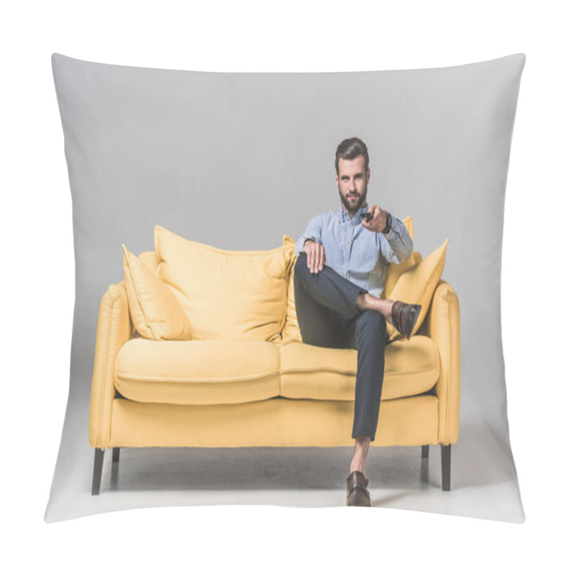 Personality  Handsome Smiling Man With Remote Control Watching TV And Sitting On Yellow Sofa On Grey Pillow Covers