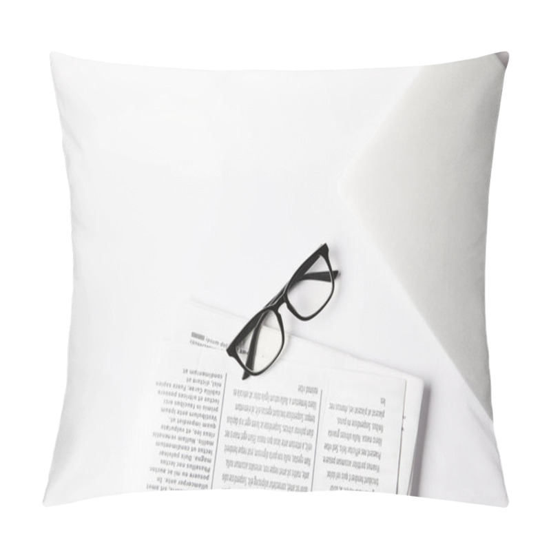 Personality  Top View Of Eyeglasses, Laptop And Newspapers On White Table Pillow Covers