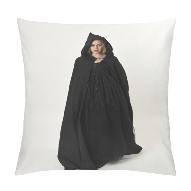 Personality  Full Length Portrait Of Blonde Girl Wearing Long Black Flowing Cloak, Standing Pose  With  A White Studio Background. Pillow Covers