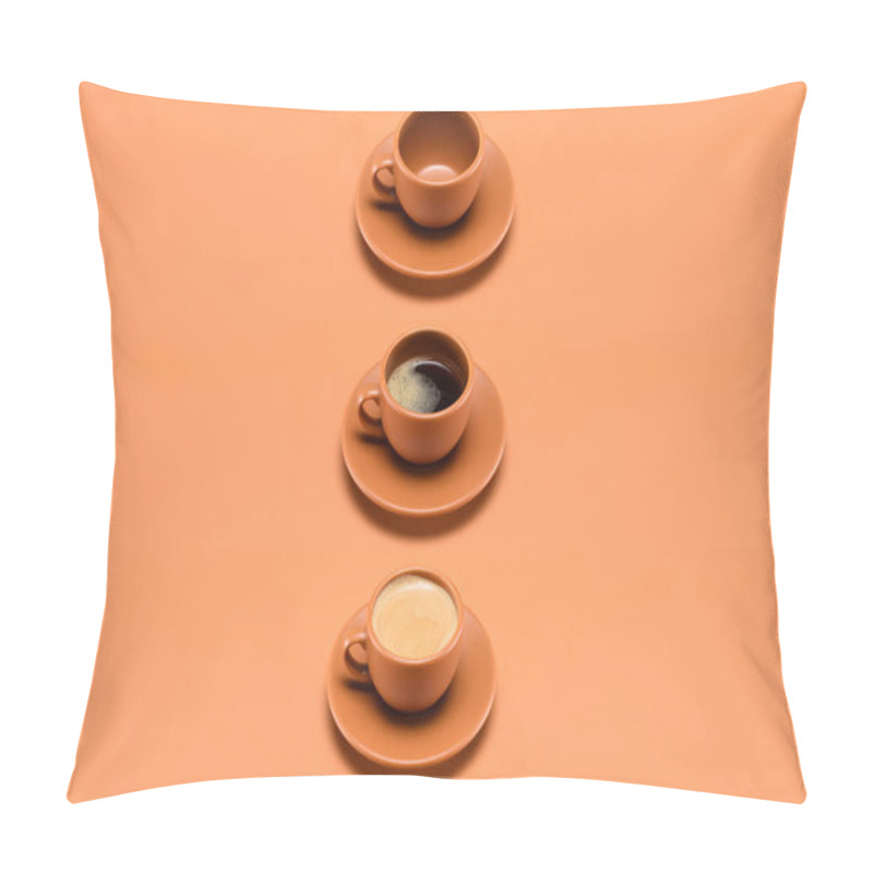 Personality  Close Up View Of Arrangement Of Empty Cup And Two Cups Of Coffee Isolated On Peach Pillow Covers