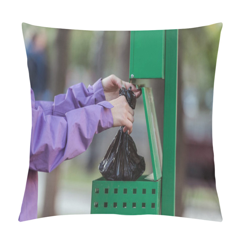 Personality  Cropped Shot Of Woman Putting Bag In Trash Can In Park, Cleaning After Pet Concept Pillow Covers