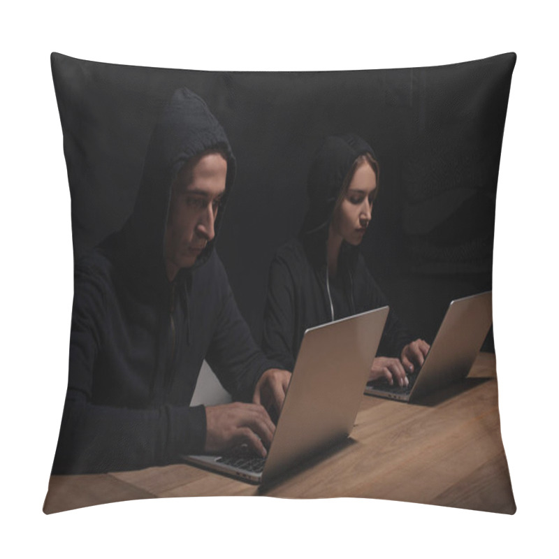 Personality  Focused Hackers In Black Hoodies Using Laptops In Dark Room, Cyber Security Concept Pillow Covers