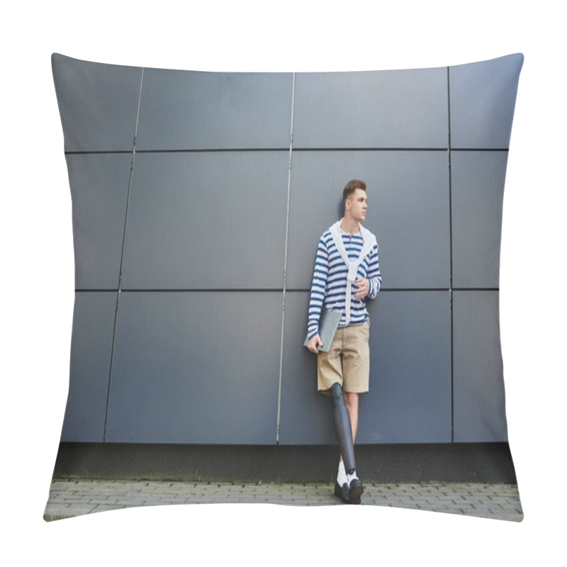 Personality  A Young Handsome Man Leans Against A Sleek Wall, Showcasing His Stylish Attire And Prosthetic Leg. Pillow Covers