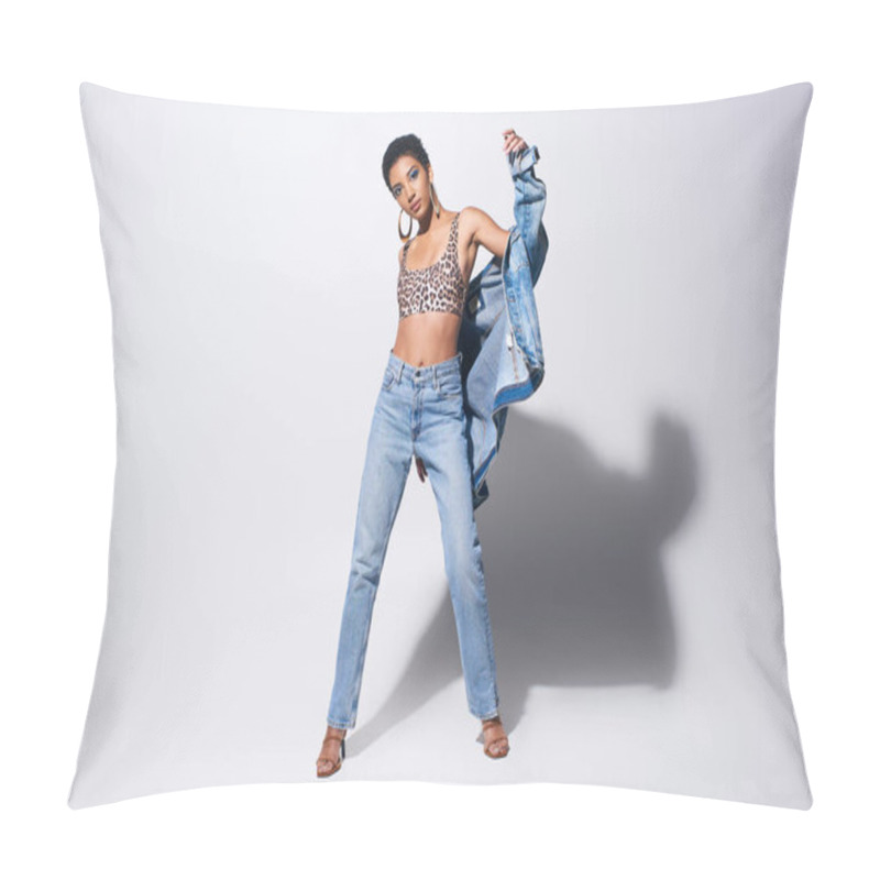 Personality  Stylish African American Model With Bold Makeup And Golden Earrings Looking At Camera While Posing In Denim Jacket And Jeans On Grey Background, Denim Fashion Concept Pillow Covers