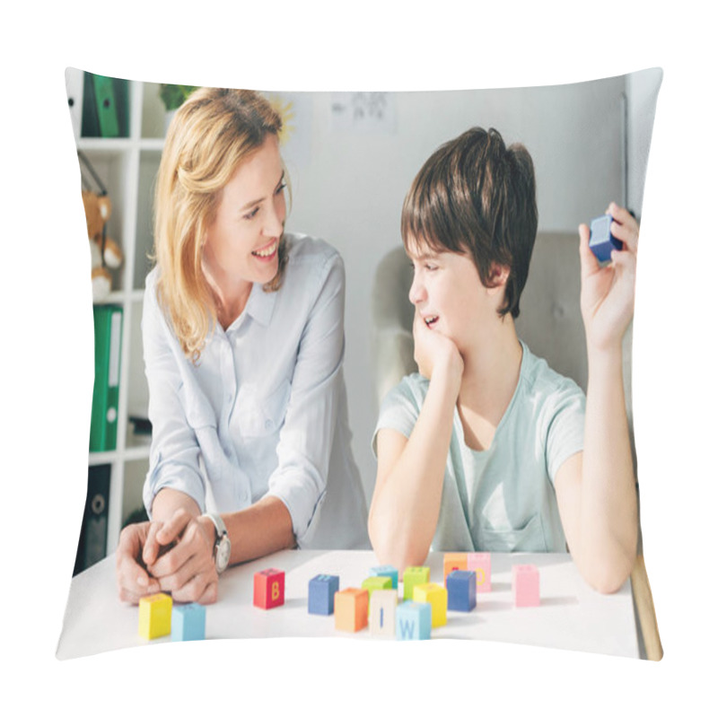 Personality  Smiling Child Psychologist Looking At Kid With Dyslexia And Sitting At Table With Building Blocks Pillow Covers