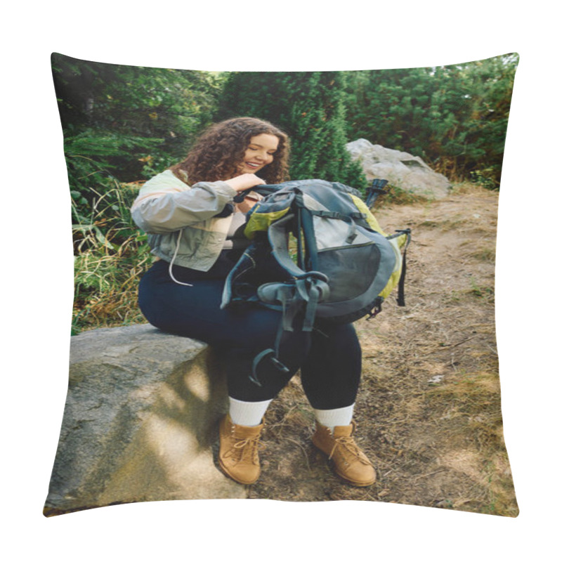 Personality  The Woman Sits On A Rock, Smiling As She Prepares Her Backpack Amidst The Serene Forest. Pillow Covers