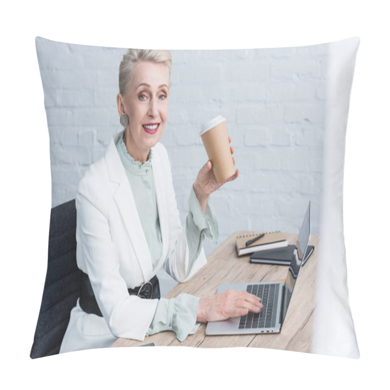 Personality  Smiling Senior Businesswoman With Disposable Cup Of Coffee Using Laptop In Office Pillow Covers