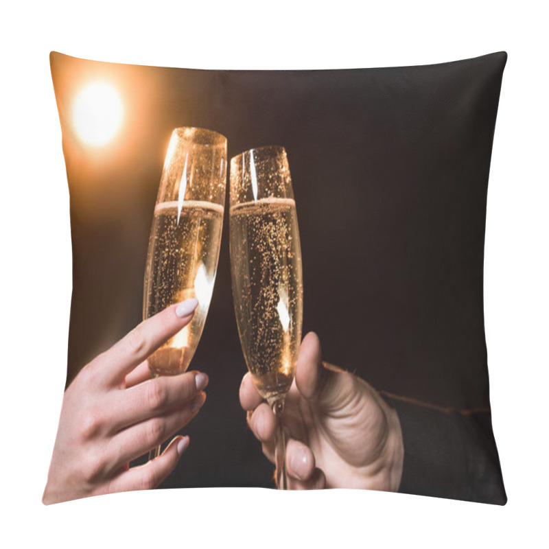 Personality  Cropped Shot Of Couple Clinking Glasses Of Champagne Under Golden Light On Black Pillow Covers