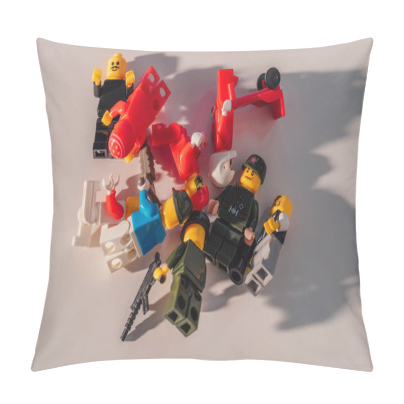 Personality  KYIV, UKRAINE - MARCH 15, 2019: Top View Of Scattered Plastic Lego Figurines On White Pillow Covers