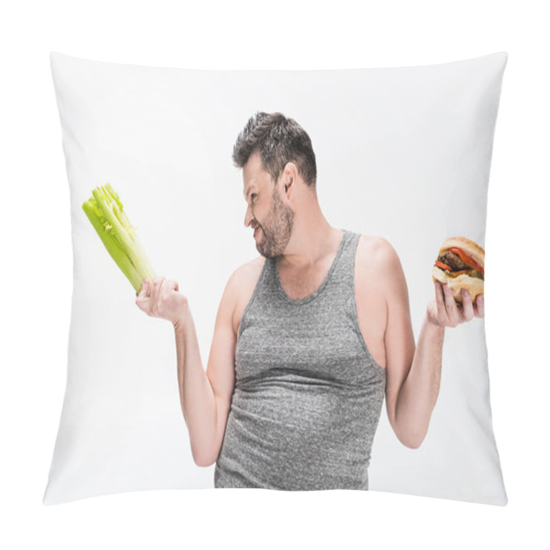 Personality  Skeptical Overweight Man Holding Celery And Burger Isolated On White  Pillow Covers