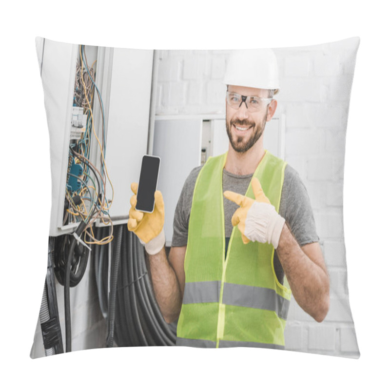 Personality  Smiling Handsome Electrician Pointing On Smartphone With Blank Screen Near Electrical Box In Corridor Pillow Covers