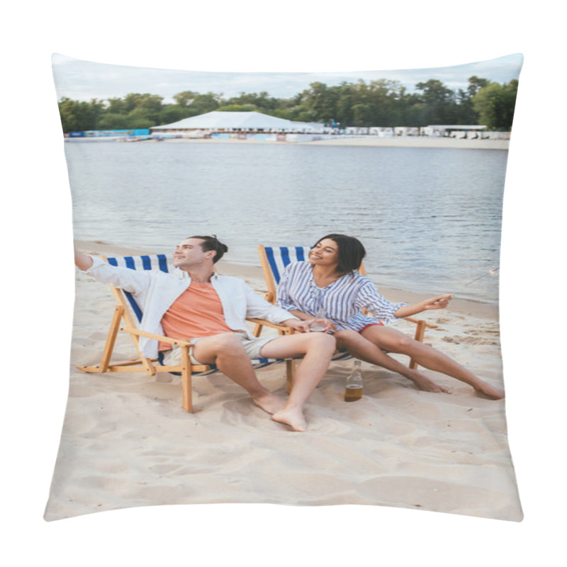 Personality  Happy Interracial Couple Sitting In Chaise Lounges And Holding Sparklers While Resting On Beach Pillow Covers