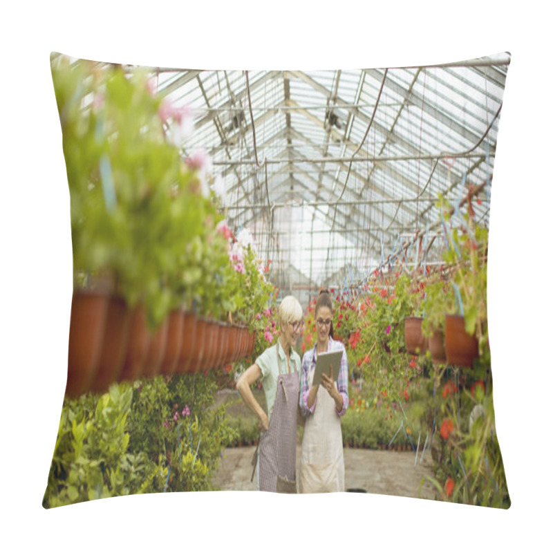 Personality  Senior And Young Modern Florist Women Selecting Flowers While Looking Instructions From A Digital Tablet Pillow Covers