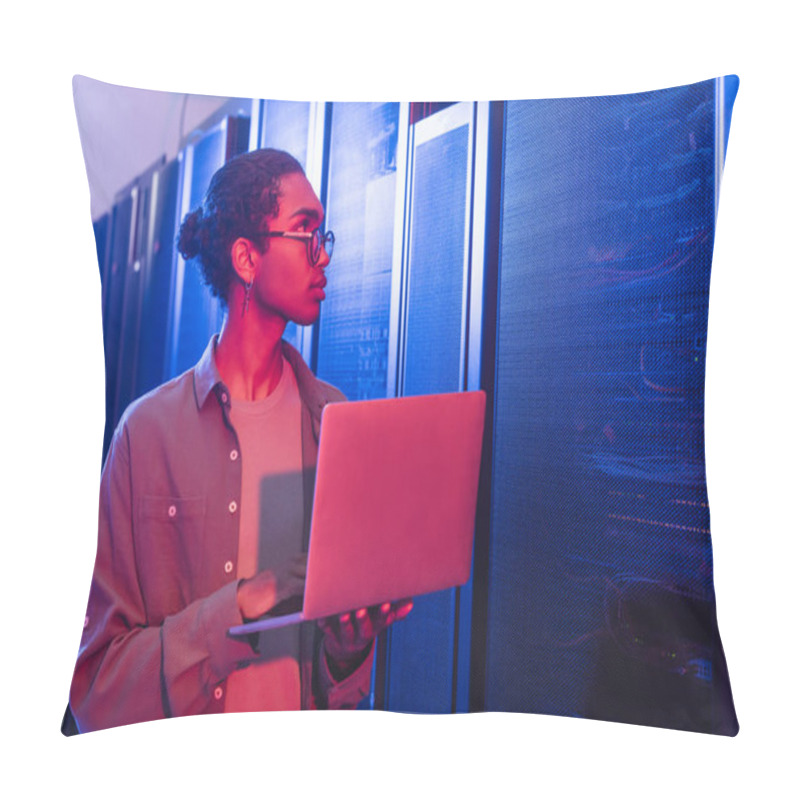 Personality  African American Technician With Laptop Looking At Servers In Data Center In Neon Light Pillow Covers