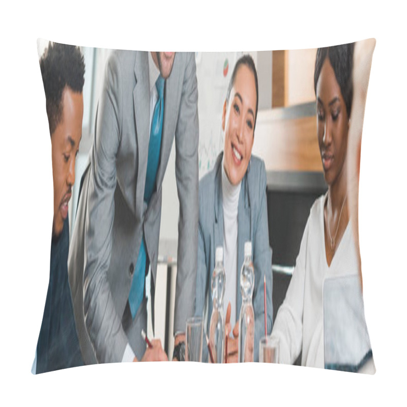 Personality  Cropped View Of Young Businessman Standing Near Smiling Multicultural Colleagues Sitting At Desk In Conference Hall, Panoramic Shot Pillow Covers