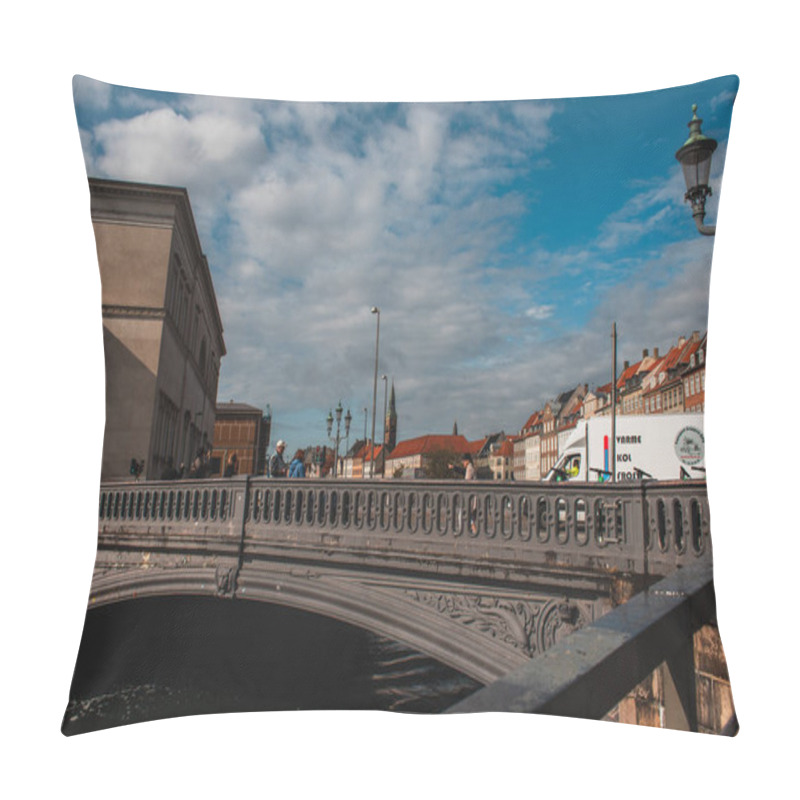 Personality  COPENHAGEN, DENMARK - APRIL 30, 2020: People Walking On Bridge With Buildings And Cloudy Sky At Background  Pillow Covers