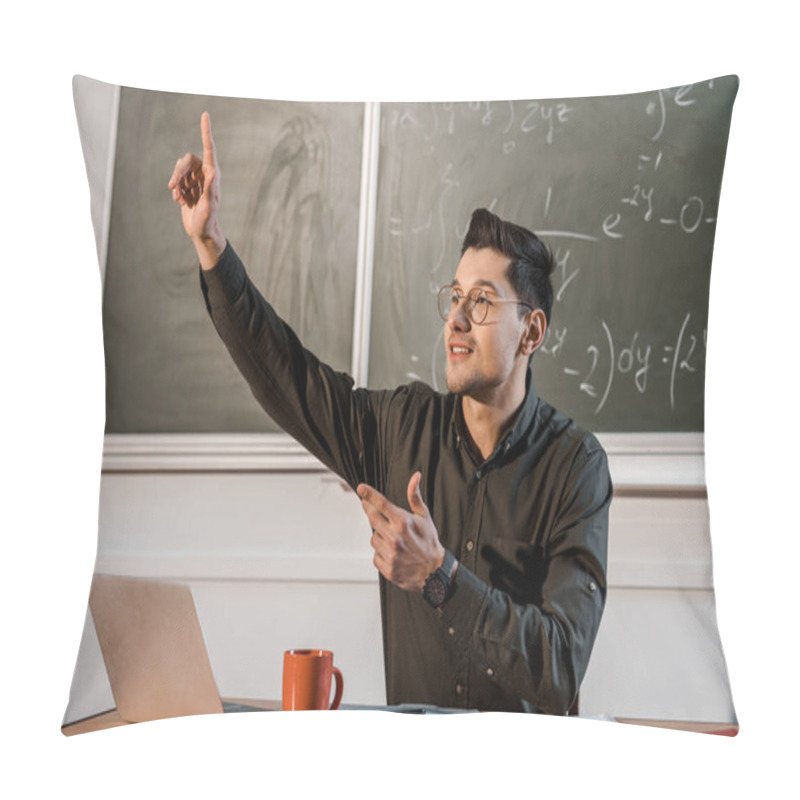 Personality  Male Teacher Sitting At Desk, Pointing Finger In Air And Explaining Equations In Maths Classroom Pillow Covers