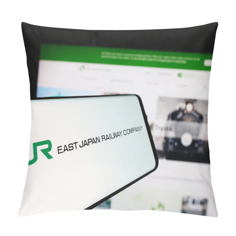 Personality  Stuttgart, Germany - 07-23-2024: Smartphone With Logo Of Japanese Railroad Business East Japan Railway Company In Front Of Website. Focus On Center-left Of Phone Display. Pillow Covers