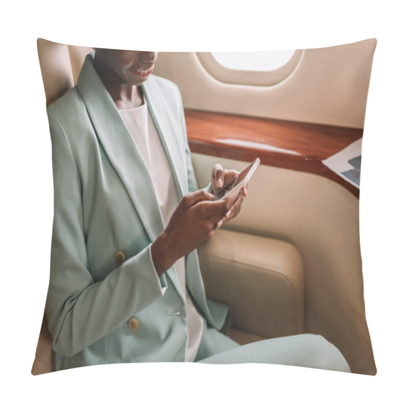 Personality  Cropped View Of African American Businesswoman Chatting On Smartphone In Private Plane Pillow Covers