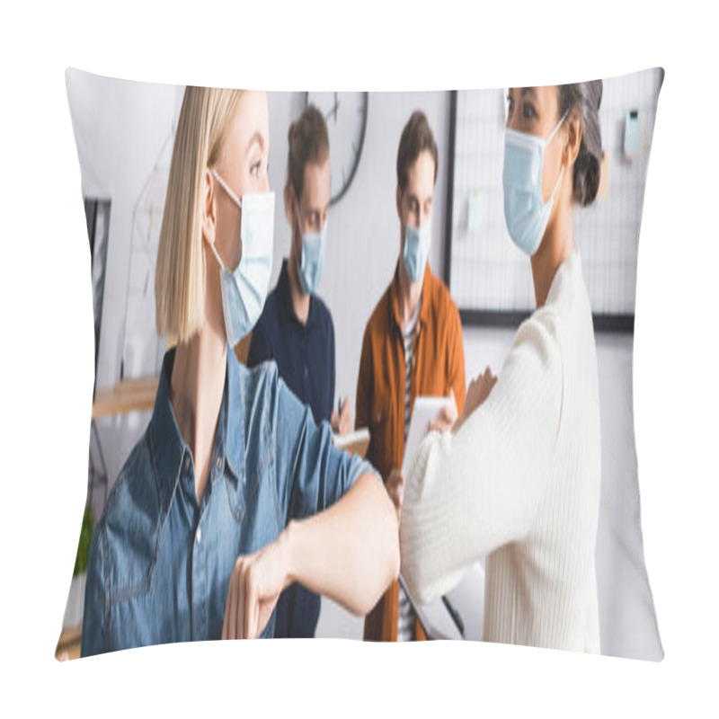 Personality  Young Businesswomen In Medical Masks Doing Elbow Bump Near Colleagues On Blurred Background, Banner Pillow Covers