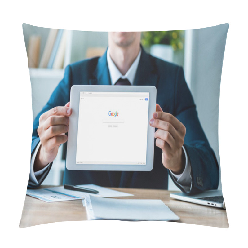 Personality  KYIV, UKRAINE - JULY 8, 2019: Selective Focus Of Man Holding Digital Tablet With Google App On Screen Near Laptop In Office  Pillow Covers