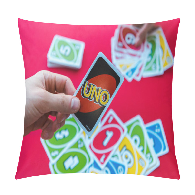 Personality  KYIV, UKRAINE - NOVEMBER 22, 2019: Cropped View Of Man Holding Uno Playing Card Isolated On Red  Pillow Covers