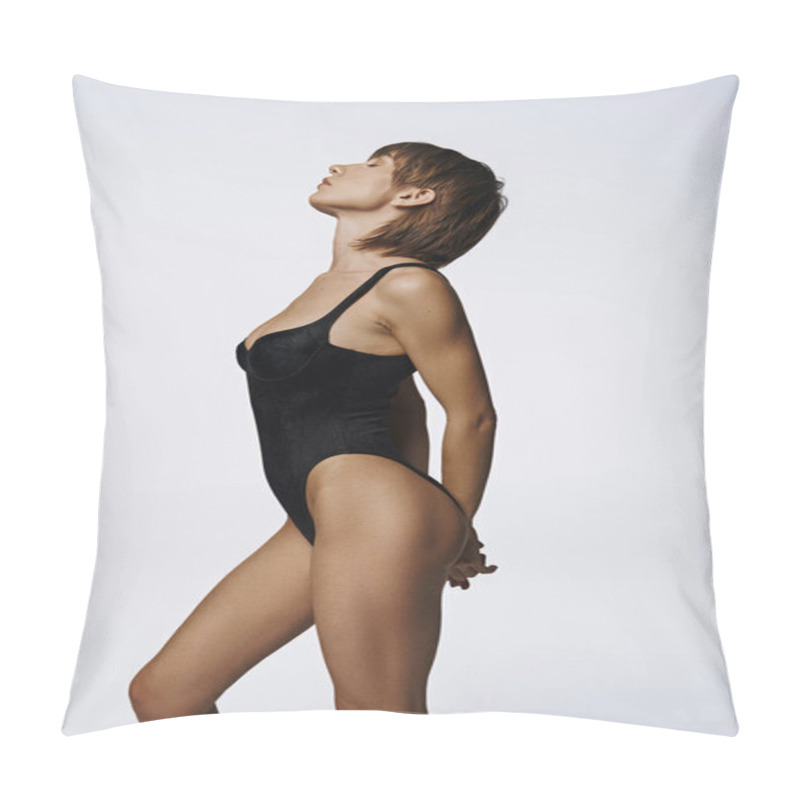 Personality  A Young Woman In A Sleek Black Swimsuit Confidently Poses For A Photo. Pillow Covers