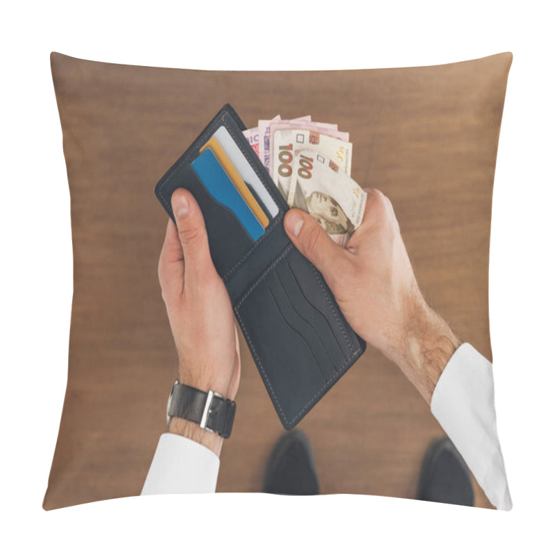 Personality  Top View Of Man Puting Hryvnyas Banknotes In Wallet With Credit Cards On Wooden Background Pillow Covers