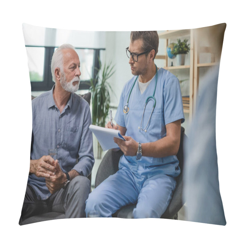 Personality  Serious Doctor Writing Medical Report While Talking With Senior Man During Home Visit.   Pillow Covers