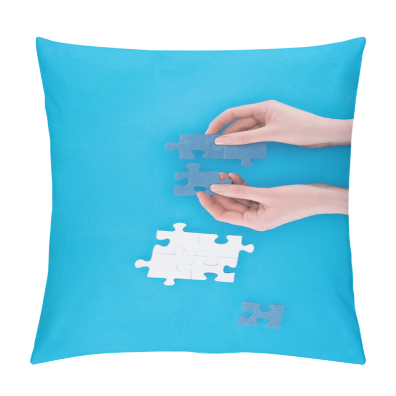 Personality  Cropped Image Of Businesswoman Assembling Blue Puzzles Isolated On Blue, Business Concept Pillow Covers