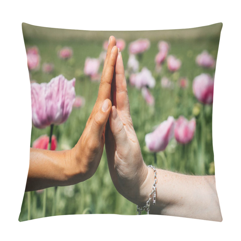 Personality  Two Womens Hands Touch Each Other Gently, A Light Touch Of Fingers In A Field Of Pink Poppies Swaying In The Wind High Quality Photo.  Pillow Covers