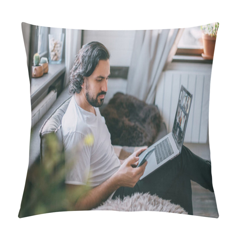 Personality  Workplace At Home. A Man Works On A Laptop At Home, Sits On A Sofa In The Living Room During The Day, Talks On The Phone. Work From Home. Pillow Covers