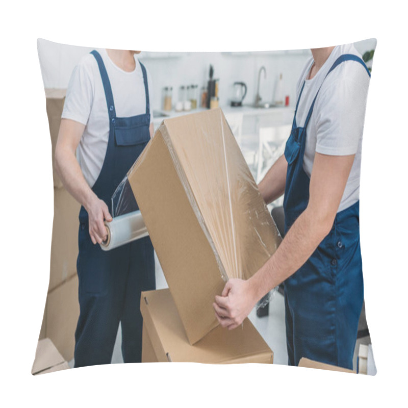 Personality  Partial View Of Movers Wrapping Cardboard Box With Stretch Film In Apartment Pillow Covers