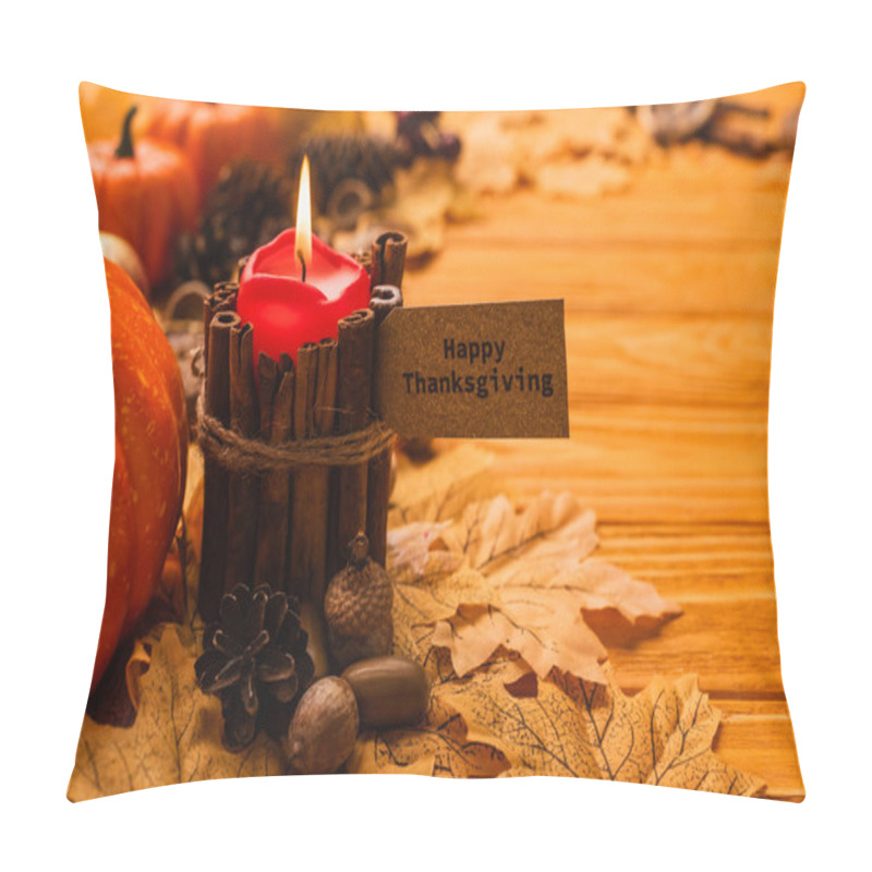 Personality  Selective Focus Of Burning Candle With Happy Thanksgiving Card And Autumnal Decoration On Wooden Background Pillow Covers