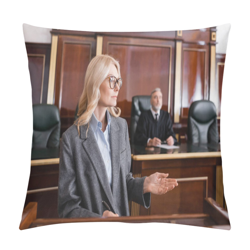 Personality   Blonde Advocate Pointing With Hand While Talking In Court Near Judge On Background Pillow Covers